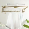 24" X 6" Modern Finish Aluminum Wall Hook Shelf Brass - Olivia & May 2 24" X 6" Modern Finish Aluminum Wall Hook Shelf Brass - Olivia & May -Office Furniture GUEST 918f41f5 bb25 417d 85d4 0edd19365122